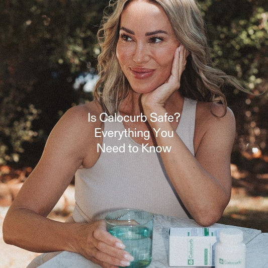 Smiling woman holding water and Calocurb supplement, representing natural GLP-1 support for appetite control