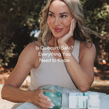 Smiling woman holding water and Calocurb supplement, representing natural GLP-1 support for appetite control